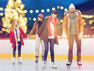 Family Ice Skating at night time